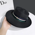 Flat top black straw hat featuring a colorful striped band and gold logo ornament - Black / Adjustable