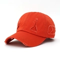 Detail of frayed orange cotton canvas baseball cap with distressed rip and vintage street style - Orange Red