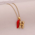 Close-up of golden necklace with crystal H letter and red pepper pendant detail - Letter H(H)
