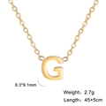Macro view of gold 18k plated G letter pendant necklace with product dimensions - Letter G