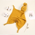 Yellow cotton gauze baby security blanket with a cute bunny design on a soft beige background - Ginger Yellow