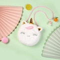 Detail of plush unicorn bag featuring golden horn and soft white faux fur texture - White