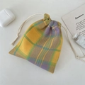 Macro detail of yellow and purple plaid cotton drawstring storage pouch on a desk - Yellow Purple Plaid (Small)