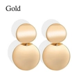 Exaggerated matte gold double disc drop earrings with a modern minimalist aesthetic - Round Gold