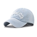 Macro detail of white New York City letter embroidery on washed light blue denim hat - Adjustable / Light Denim