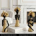 Modern black and gold resin goddess statue with floral head and woven texture - Elegant Black Woman - Small Size Three-piece Set