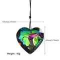 Detailed macro of a 45mm heart-shaped crystal prism pendant with rainbow light effects - 4.4cm*4.5cm / Multicolor