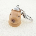 Detailed view of 3D Capybara keychain with resin finish and silver metal clasp - Capybara with White Hat