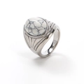 Macro shot of vintage silver ring featuring a white turquoise stone with grey veins - Steel White Turquoise