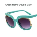 Oversized turquoise green sunglasses with gold accents and gradient grey lenses - Green Frame / Double Grey