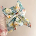 Checkered hair scrunchie with colorful floral patterns in blue, yellow, and orange - Azure Oil Painting Floral