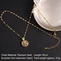 Golden rotating clover necklace in titanium steel with green and pink crystals - Circular Pink & Green Gemstone Style (A852)
