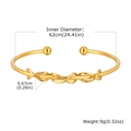 Macro shot of gold infinity knot detail on stainless steel bangle with dimensions - Triple Knot Style B-706G
