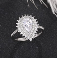 Elegant silver pear-shaped cubic zirconia ring with double halo and pavé setting - Ur0720