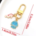 Golden keychain with pink seahorse and blue jellyfish enamel pendants and size markings - Enamel Seahorse Jellyfish U-Shape Keychain-LS564