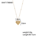 Dettaglio del ciondolo a cuore dorato con misura 1,8 cm e catena regolabile da 45 cm - Cuore Perlato Oro