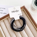 Close-up of black and grey high elasticity hair bands on a minimalist display card - Thin Double-strand Style / Black White Gray Series