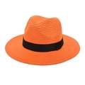 Close-up of bright orange straw Panama hat featuring a contrasting black ribbon band - Orange