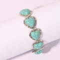 Bracciale vintage cuore turchese con motivi etnici incisi su supporto bianco - Verde