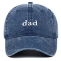 Close-up of white dad embroidery on washed navy blue cotton denim baseball cap - DAD / Navy Blue