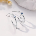 Polished silver earrings with blue gemstones and size measurements in 11mm outer diameter - EH766 Blue Gemstone Hoop Earrings