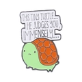 Cartoon green turtle enamel pin with humorous text bubble on a white background - Judgmental Turtle