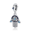 Macro shot of S925 sterling silver Hamsa hand charm with blue and white zircon stones - Black Enamel Hamsa Hand