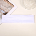 White breathable cotton sports headband for yoga and running exercise on neutral background - White