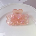 Detailed view of pink acetate hair claw clip with bow design and rhinestone center - 2# Iridescent Orange