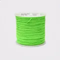 Close-up of 0.8mm bright green cord on a white spool for DIY jewelry and knotting - Color F231 Neon Yellow