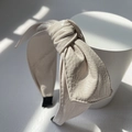 Creamy white PU leather headband with stylish bow knot and wide side texture design - White