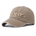 Detail of distressed brim and New York embroidery on washed cotton baseball cap - Adjustable / Khaki