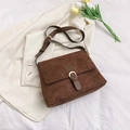 Retro dark brown matte shoulder bag with a metal buckle and adjustable strap - Brown