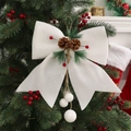 White glitter Christmas bow with pine cones and red berries hanging on a festive tree - 25cmx30cm / White