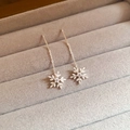 Macro shot of silver snowflake earrings with long chains and sparkling zircon stones - Silver Long Tassel Snowflake Ear Threaders (28# Silver Pin-Silver)