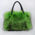 High-end faux fur tote bag in green and black with black leather handles on white background - Green