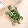 Vintage turtle brooch with green crystal and gold-plated alloy finish for women - Green Turtle