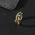 Macro detail of gold evil eye ring with white cubic zirconia and blue enamel inlays - U-Wave Zircon Blue Eye