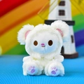 Close-up of a cute white cream bear plush keychain with soft fur and purple paw details. - Long Hair Bear - White / 12cm