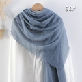 Gray blue pleated cotton linen scarf with frayed edges displayed on wooden hanger - Grey Blue