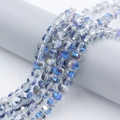 Detailed macro view of multifaceted aurora blue crystal beads for DIY jewelry making - Translucent Blue