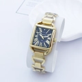 Elegant gold square quartz watch for women with black Roman numeral dial on a white stand - Black