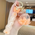 Fairy Tales peach bear liquid keychain with wave strap and heart bead container - Letter Bead Perfume Bottle - Orange
