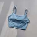 Camisole de sport bleu clair rembourrée avec fines bretelles et tissu élastique sans couture - S / Hauts / Bleu ciel