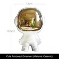White ceramic astronaut figurine with gold visor for home decor, 19.5cm height - Cute Astronauts