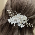 Elegant bridal hair clip with white shell flowers, pearls and crystals on gold wire - Gold Wire White Flower