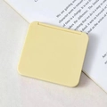 Mini square folding makeup mirror in pale yellow with a compact portable matte finish - Beige