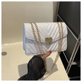 White V-quilted faux leather crossbody bag with gold heart buckle and chain strap - White