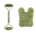 Macro shot of green jade facial roller and heart-shaped gua sha tool set with gold metal - Figure 4 (Green Roller And Gua Sha)