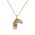 Elegant gold plated toucan pendant necklace with pink and black cubic zirconia stones - Toucan